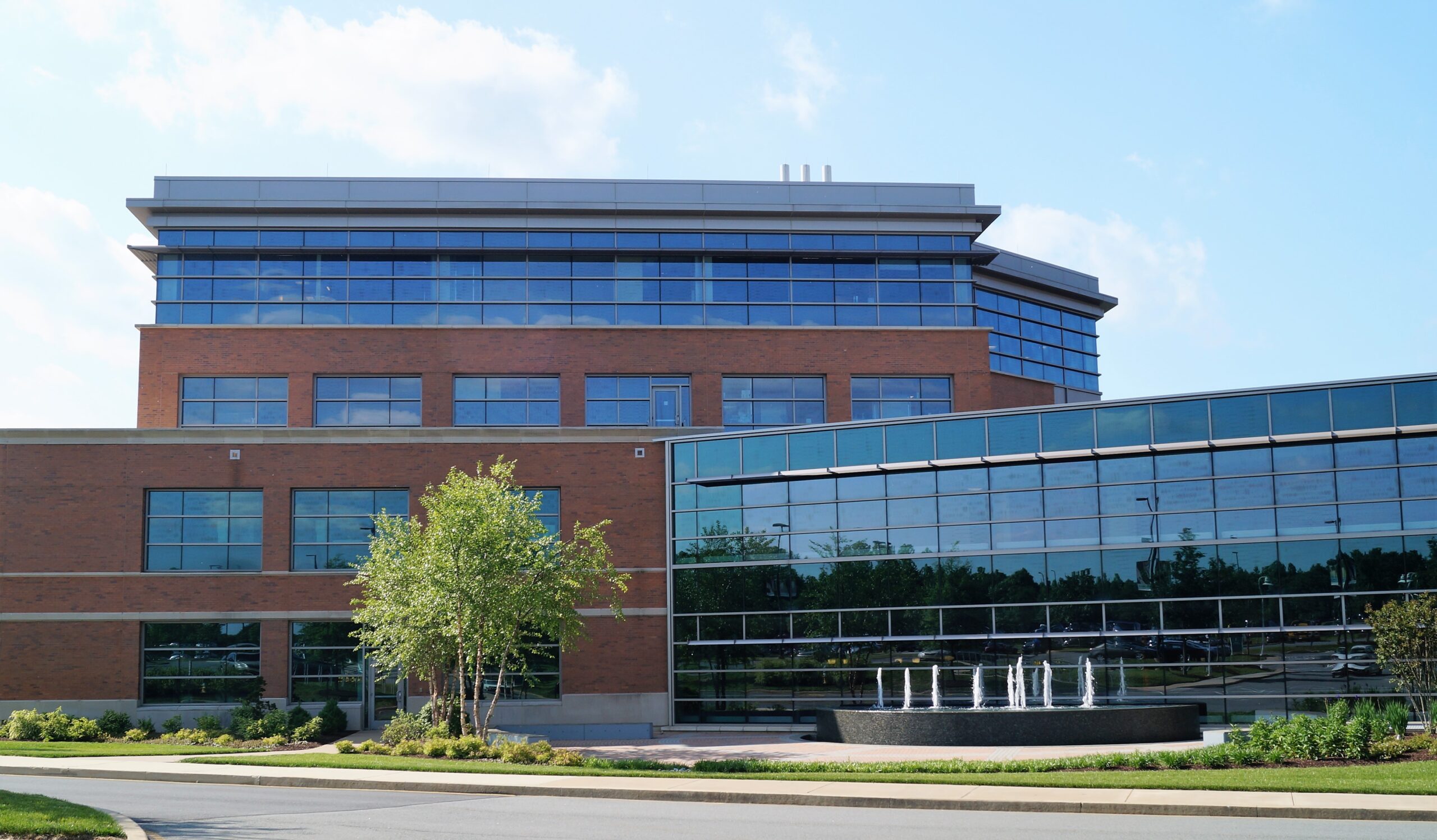 medical office building with water feature in front